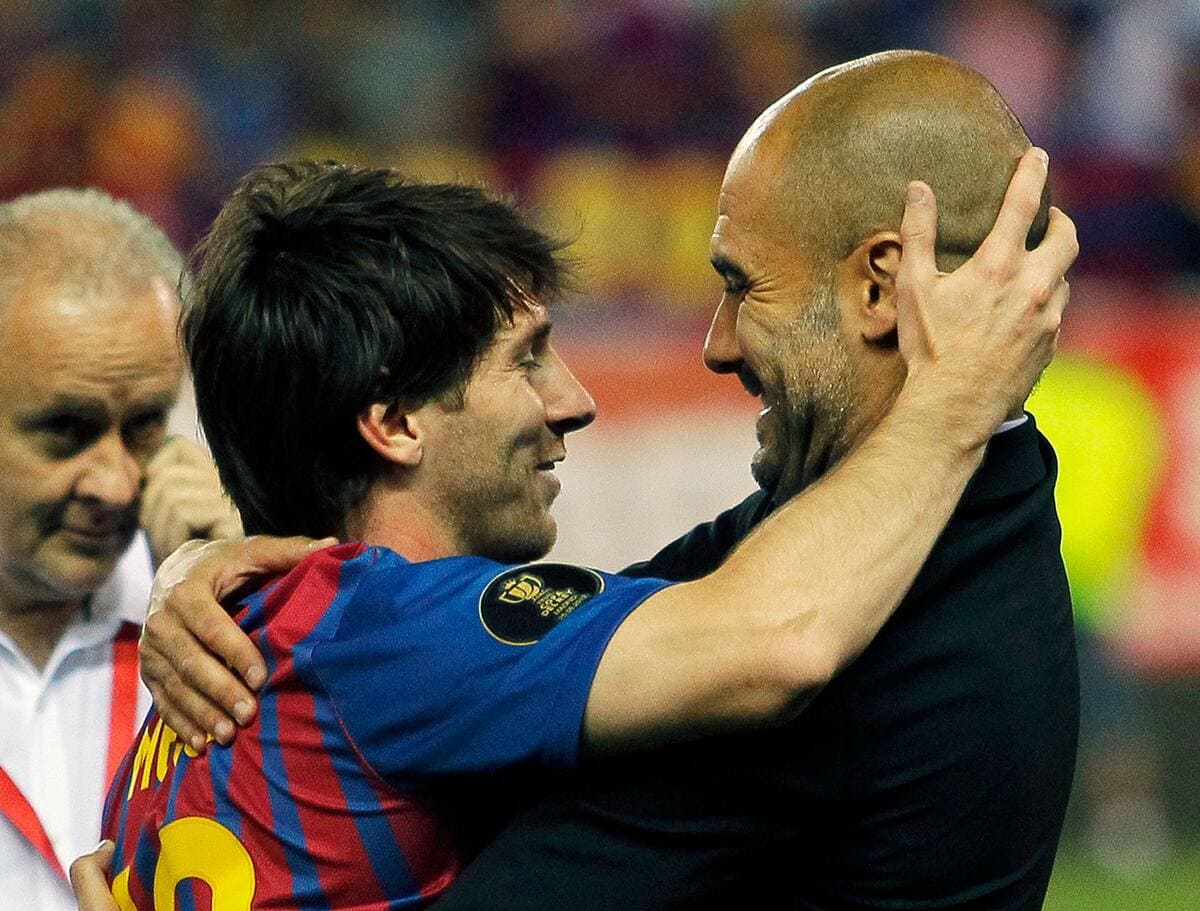 Pep Guardiola and Lionel Messi